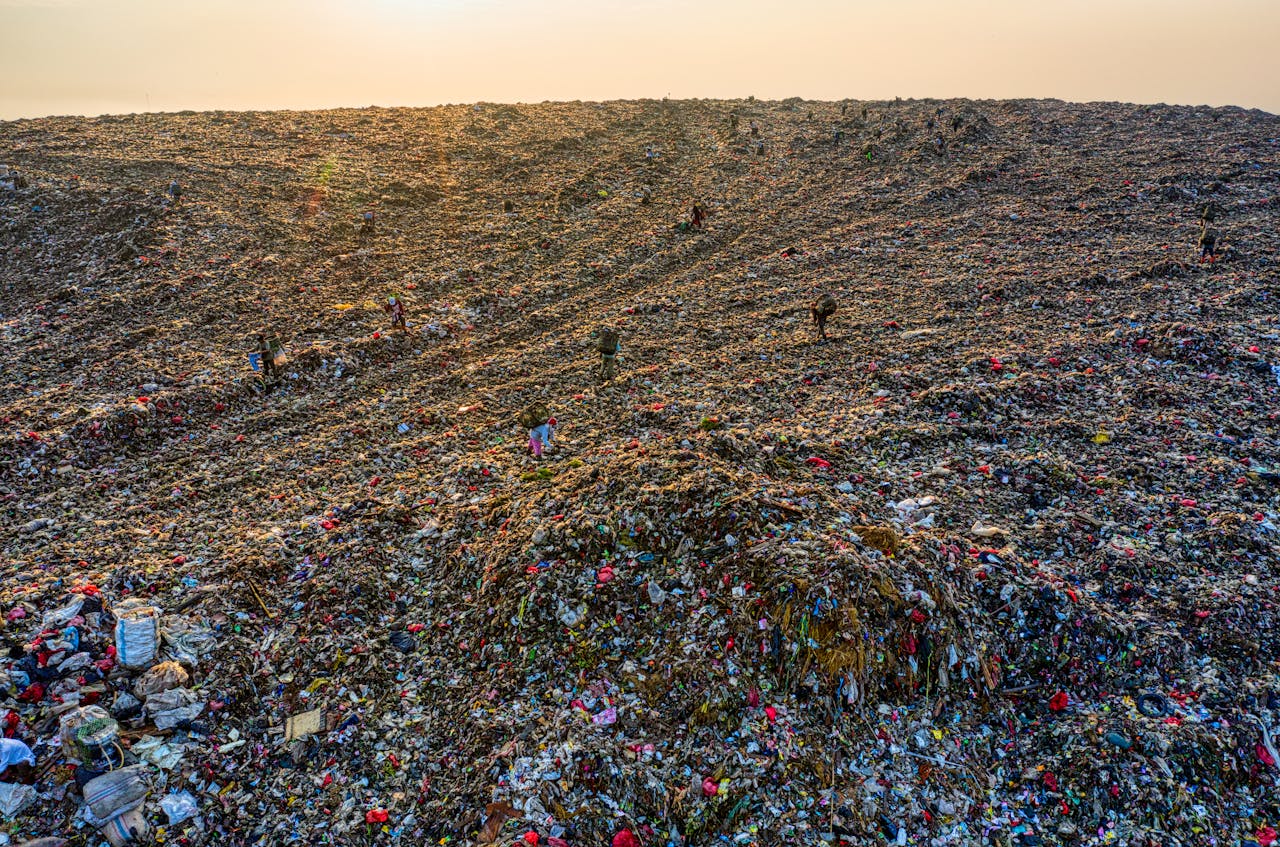 Drone shot of a massive landfill highlighting environmental pollution in West Java, Indonesia.